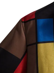 Geometric color block shirt fabric detail close-up, showing clear digital print texture.