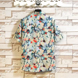 Detail view of the men's summer short-sleeve resort shirt featuring abstract stone print.