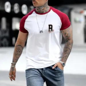 Men's contrast raglan short sleeve t-shirt casual streetwear tee with graphic letter print.