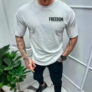 Men's textured short sleeve t-shirt casual streetwear crewneck top with fashion chest letter print.