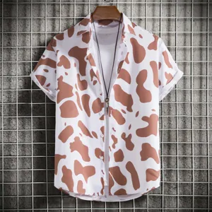 Men's casual short sleeve shirt featuring trendy brown and white cow print design.