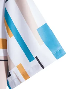 Close-up detail of mens short sleeve shirt sleeve with modern geometric abstract print pattern.