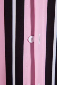 Men casual striped shirt detail view with pink black white vertical stripes and button placket.