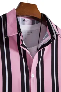 Men's striped short sleeve shirt detail view showing collar, buttons and fabric texture.
