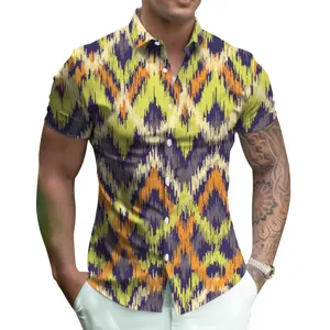 Close-up of men's short sleeve shirt featuring abstract 3d geometric chevron print design.