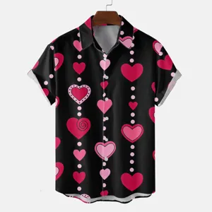 Detailed view of the black short-sleeve shirt featuring a charming pink and red heart pattern.