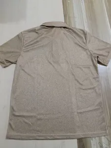 Detailed back view of men outdoor tactical short sleeve polo shirt, breathable fabric.
