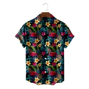 Close-up detail view of the tropical flamingo and pineapple print short sleeve Hawaiian shirt.