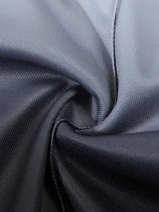 Detail view of the premium gradient fabric texture for men's casual two piece sportswear set.