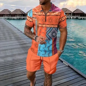 Summer tropical print half-zip polo shirt and matching casual shorts resort outfit detail view.