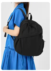 Casual black backpack lightweight large capacity travel school bag for daily commuting unisex.