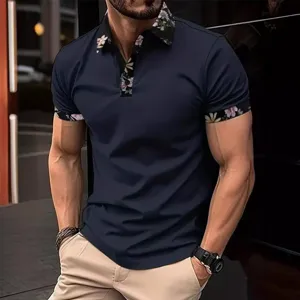 Men's dark blue short sleeve polo shirt featuring floral collar and cuffs casual top.
