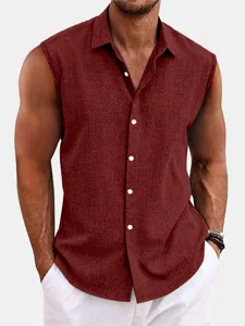Men's burgundy sleeveless button-down shirt detail showing textured fabric and classic lapel.