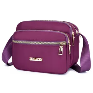 Purple nylon crossbody bag for women, multi-zipper casual shoulder bag with oxford cloth.