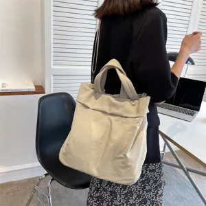 Minimalist large capacity canvas tote bag for women, casual daily shoulder handbag style.