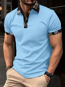 Detailed view of men short sleeve polo shirt featuring floral print collar and casual style.