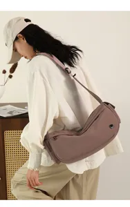 Casual nylon crossbody bag for women, stylish minimalist shoulder bag for daily commute and travel.