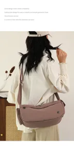 Detail view of stylish nylon crossbody bag, large capacity casual daily commuter shoulder bag.