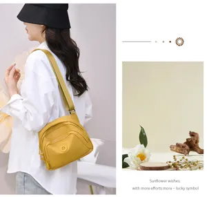 Casual nylon crossbody bag for women, trendy solid color single shoulder shell bag, lightweight.