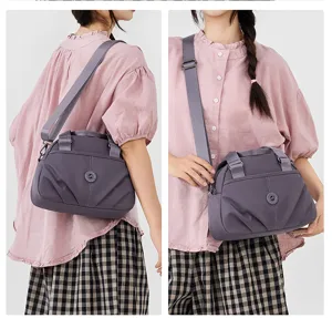 Detailed view of women casual nylon crossbody shoulder bag, lightweight multi-pocket design.