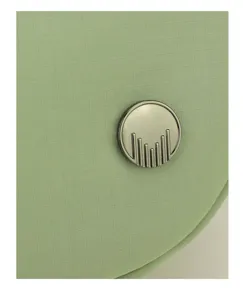 Close-up detail shot of light green nylon crossbody bag featuring elegant metallic round logo hardware.