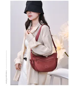 Women nylon shoulder crossbody bag multi-layer casual handbag stylish maroon daily purse.