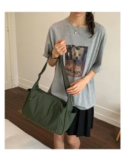 Large capacity green nylon shoulder bag casual crossbody tote bag for daily commute.