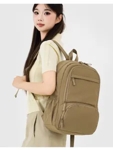 Casual khaki school backpack for women and men, stylish college style travel sports bag.