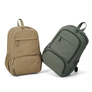 Casual nylon school backpack for men and women, stylish travel daypack with multiple pockets.