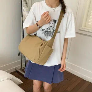 Large capacity casual khaki shoulder bag, versatile nylon messenger bag for women commuting.