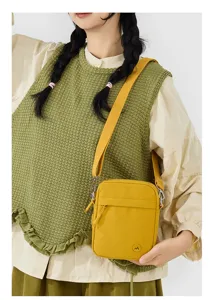 Trendy yellow crossbody phone bag for women, casual niche design single shoulder purse.