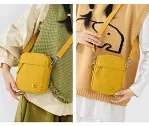 Yellow casual crossbody bag for women, simple stylish daily shoulder phone bag with zipper.