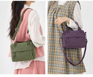 Casual canvas crossbody bag with adjustable strap, lightweight daily commuting shoulder bag.
