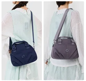 Women's nylon crossbody shoulder bag, lightweight multi-pocket commuter handbag variant.