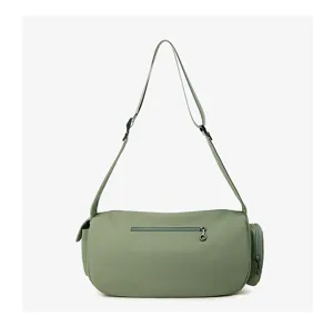Close-up detail of green nylon crossbody bag with back zipper pocket and adjustable strap.