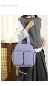 Multi-pocket nylon shoulder bag, large capacity casual crossbody handbag for daily use.