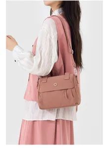 Detailed view of the casual retro crossbody shoulder bag, lightweight fabric design with strap.