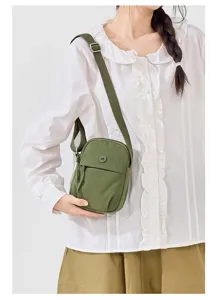 Casual nylon crossbody bag for women, lightweight small shoulder bag with adjustable strap.