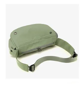 Green nylon casual crossbody shoulder bag detail view with adjustable strap and zip pocket.