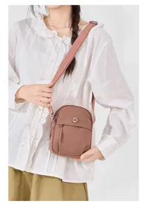 Stylish lightweight nylon crossbody bag for women, casual daily shoulder bag with zipper.
