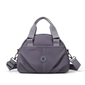 Women nylon casual handbag versatile shoulder crossbody tote bag with multi-layer capacity.
