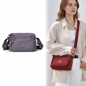 Stylish nylon crossbody bag for women, casual multi-pocket shoulder bag, lightweight daily purse.