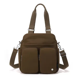 Dark brown multi-pocket nylon shoulder bag casual crossbody tote bag main view display.