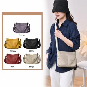 Casual nylon crossbody bag for women, large capacity stylish shoulder bag for daily commute.