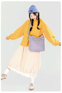 Casual nylon shoulder bag for women, large capacity tote purse for daily commute and school use.