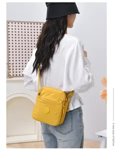 Casual nylon crossbody bag multi-compartment yellow shoulder bag for women daily use