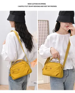 Detailed view of the casual multi-layer crossbody bag, lightweight versatile design.