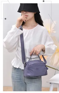 Casual multi-layer crossbody shoulder bag for women, lightweight versatile small square bag.