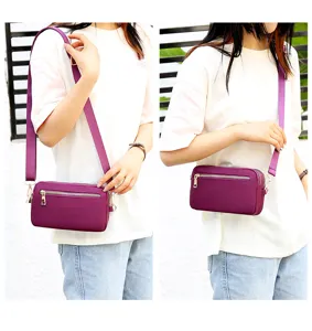 Purple nylon crossbody shoulder bag for women, multi-pocket travel small square bag.
