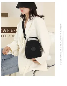 Black nylon multi-way shoulder bag for women, casual daily crossbody backpack and handbag.